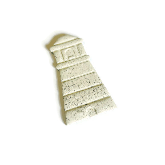 Lighthouse magnet on a white background
