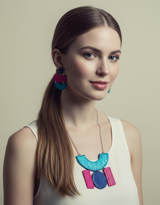 Statement necklace with turquoise and pink geometric pendants on fine silver chain
