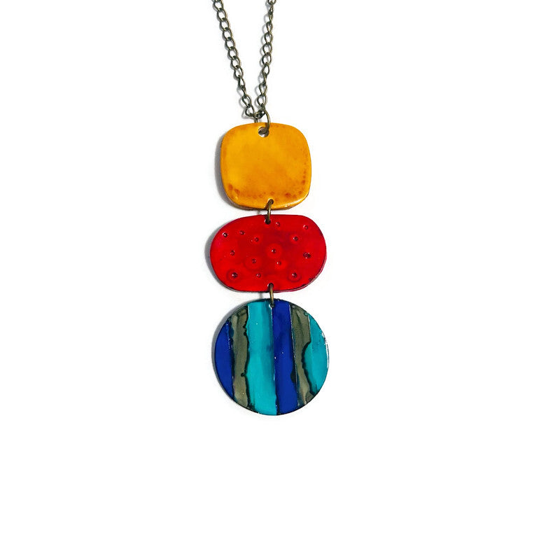 Necklace with colorful pendant on a white background