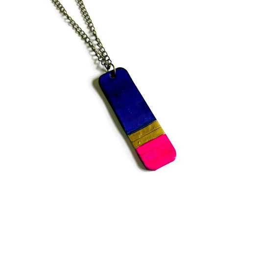 Colorful pendant necklace on a white background