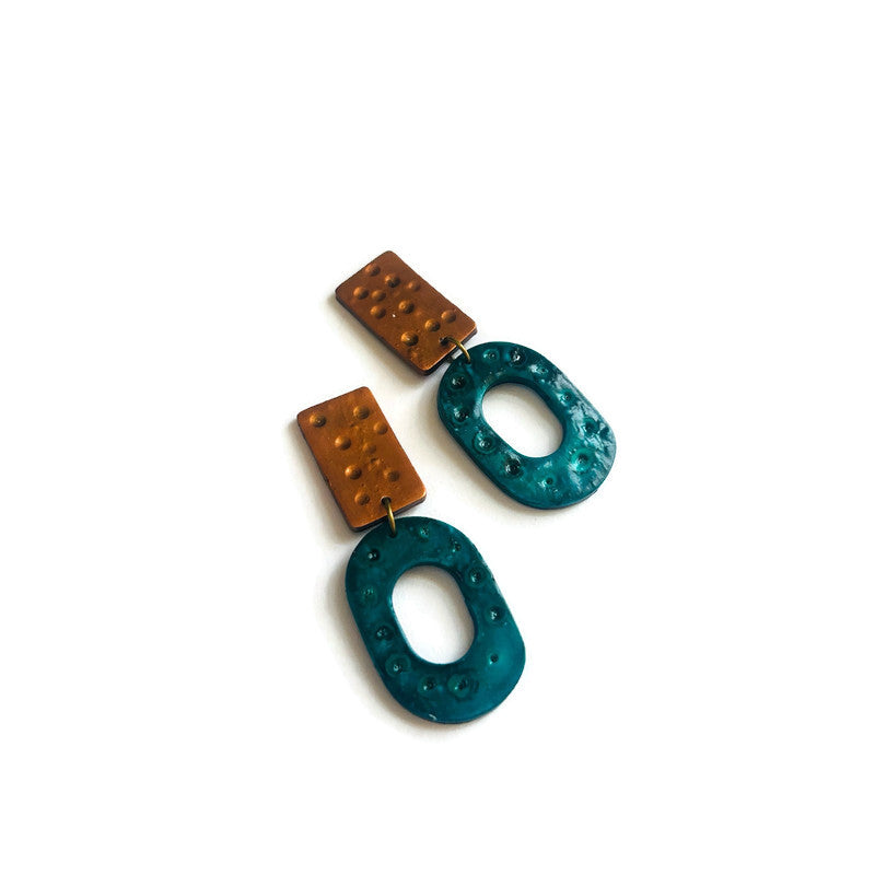 Pair of earrings with teal hoops and copper rectangle