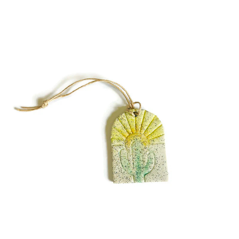 Decorative ornament with a cactus design on a white background