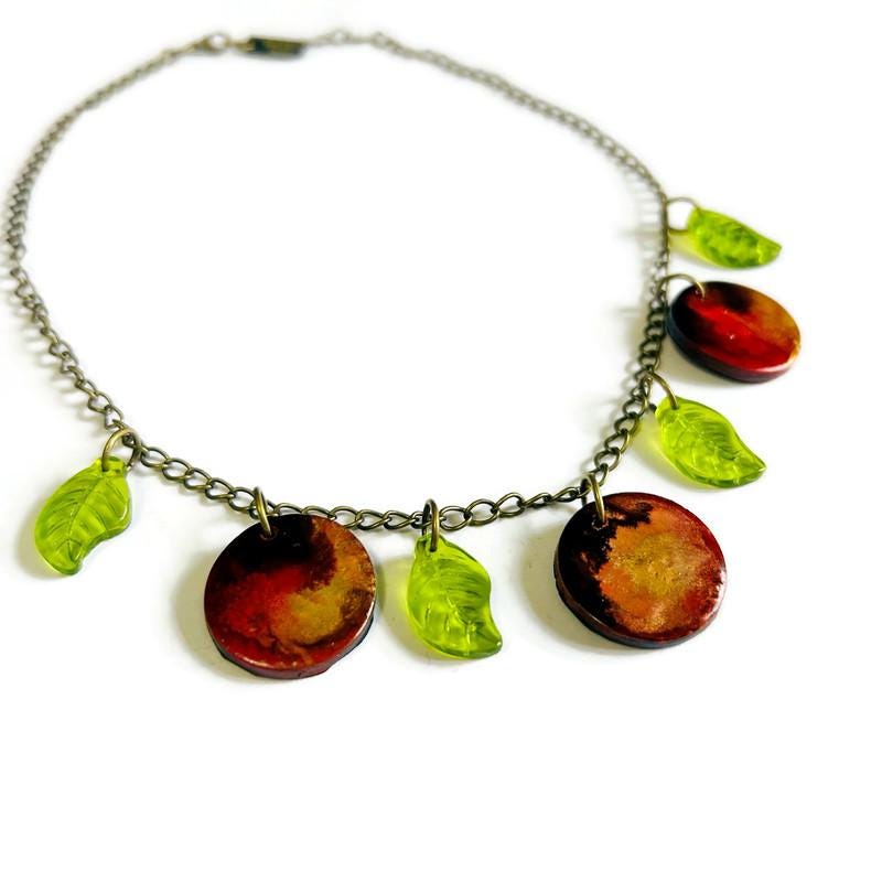 Necklace with leaf-shaped charms on a white background