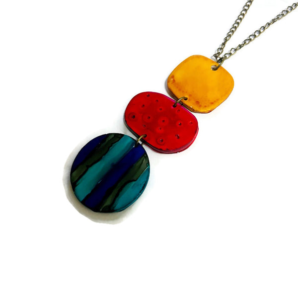 Colorful pendant necklace on a white background