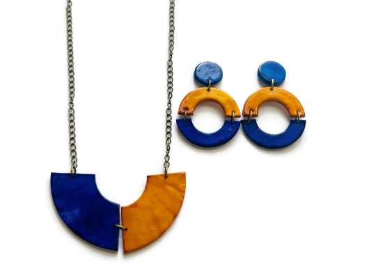 Colorful necklace and earrings on a white background