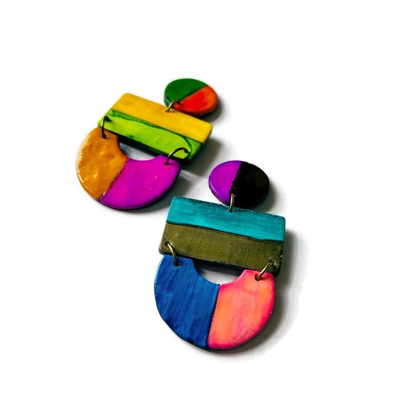 Colorful geometric earrings on a white background