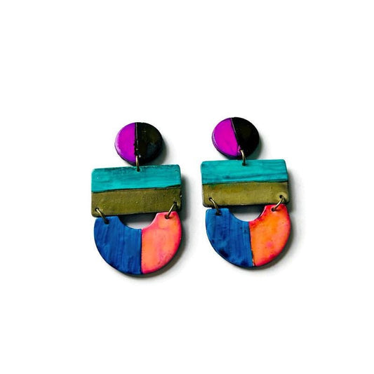 Colorful geometric earrings on a white background