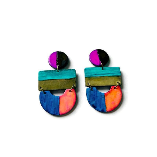 Colorful geometric earrings on a white background