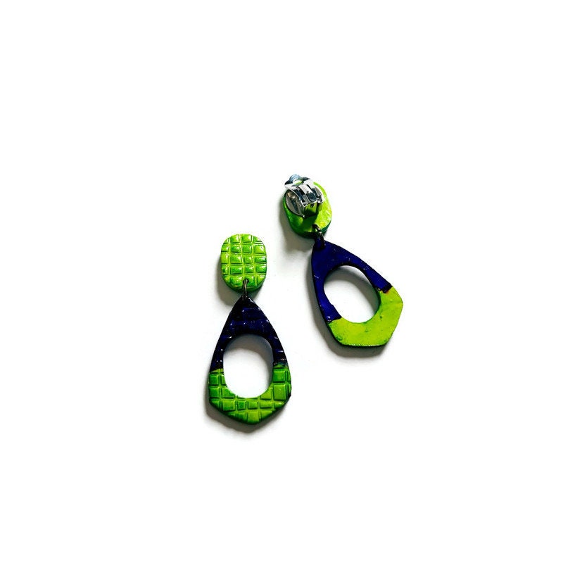 clip on earrings in neon blue and green