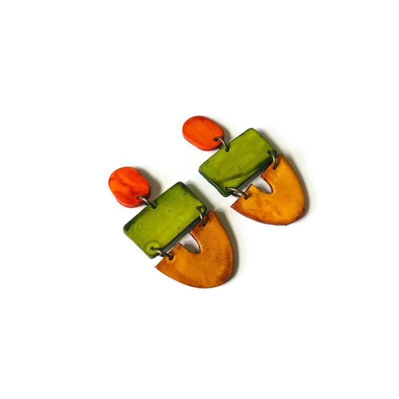 Pair of colorful earrings on a white background