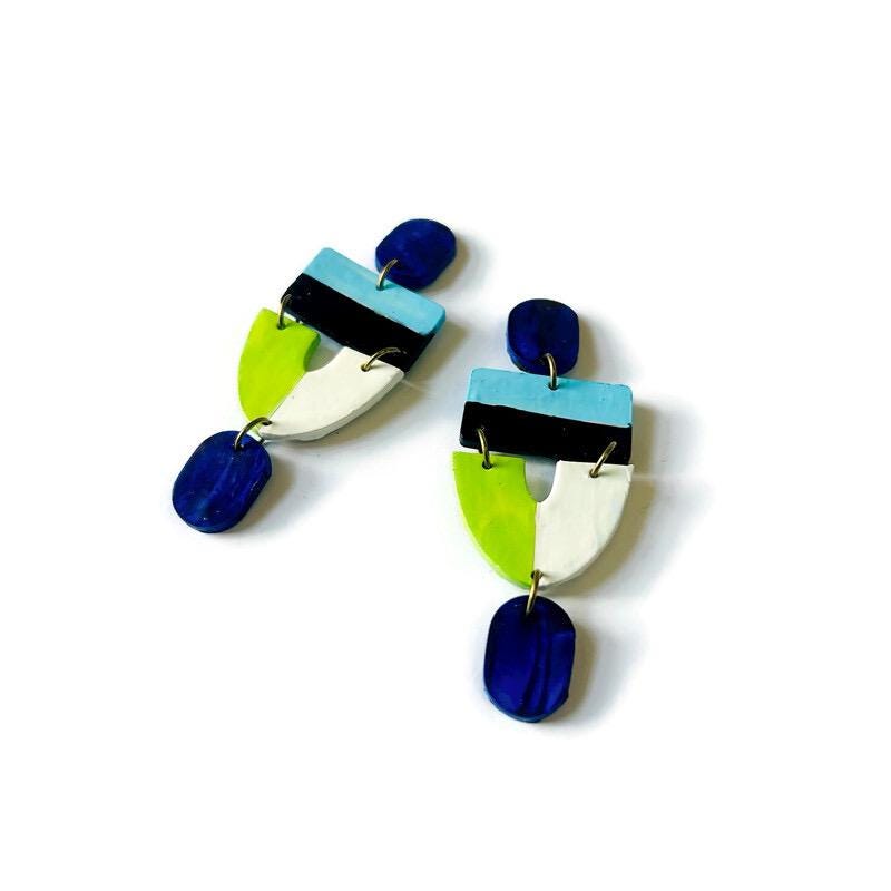 Colorful geometric earrings on a white background