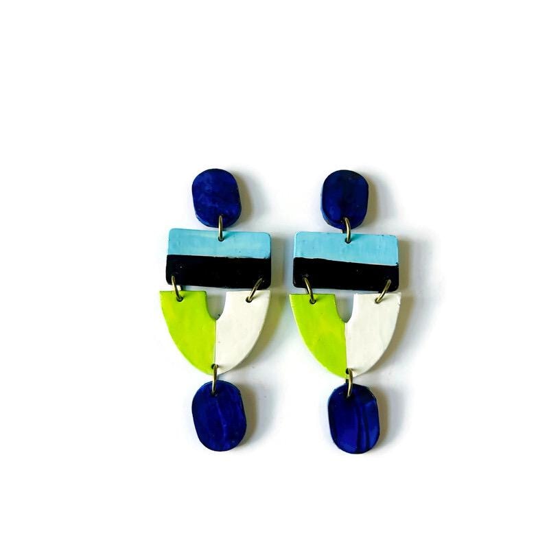 Colorful geometric earrings on a white background