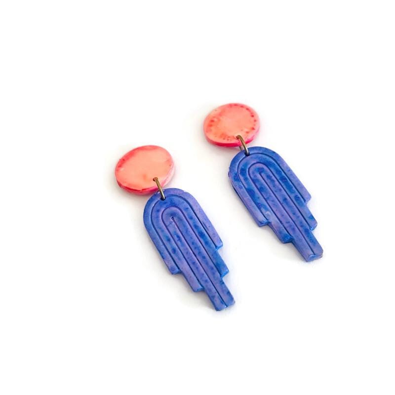 Polymer clay dangle earrings: pink round studs with blue arch-shaped drops