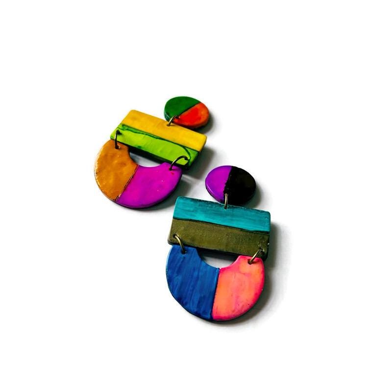 Colorful geometric earrings on a white background