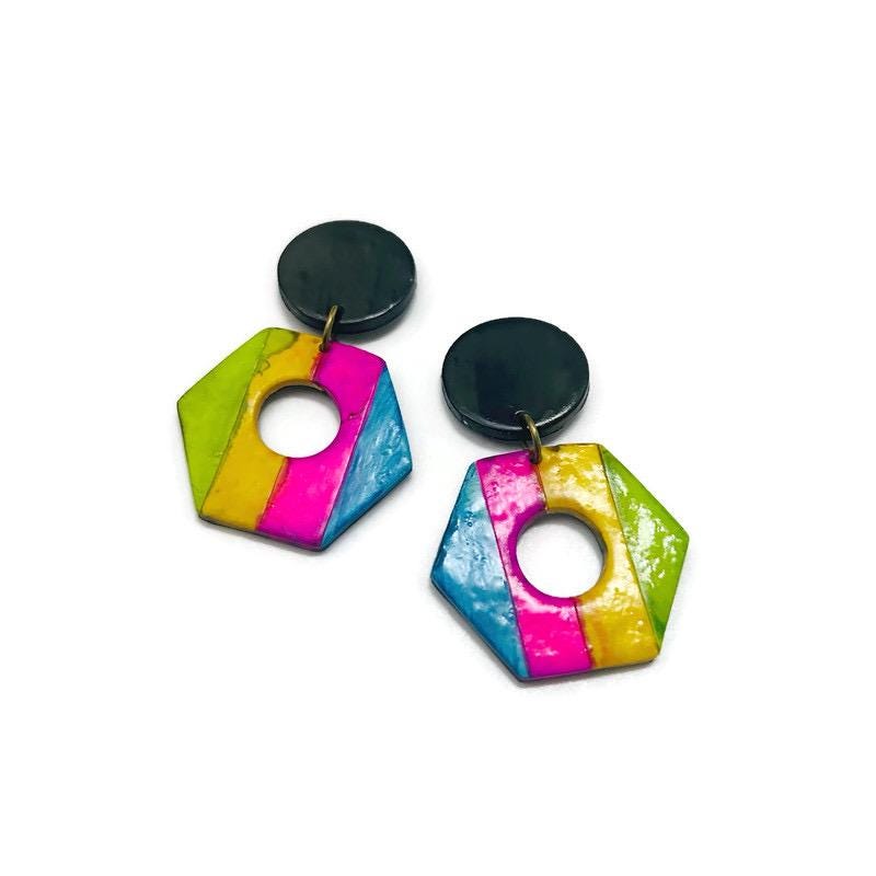 Colorful geometric earrings on a white background
