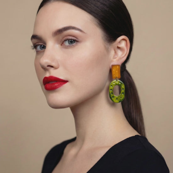 Woman wearing rustic statement earrings