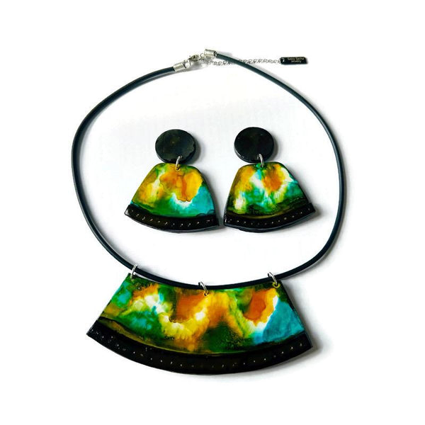 Necklace with matching earrings featuring tie-dye design on a white background