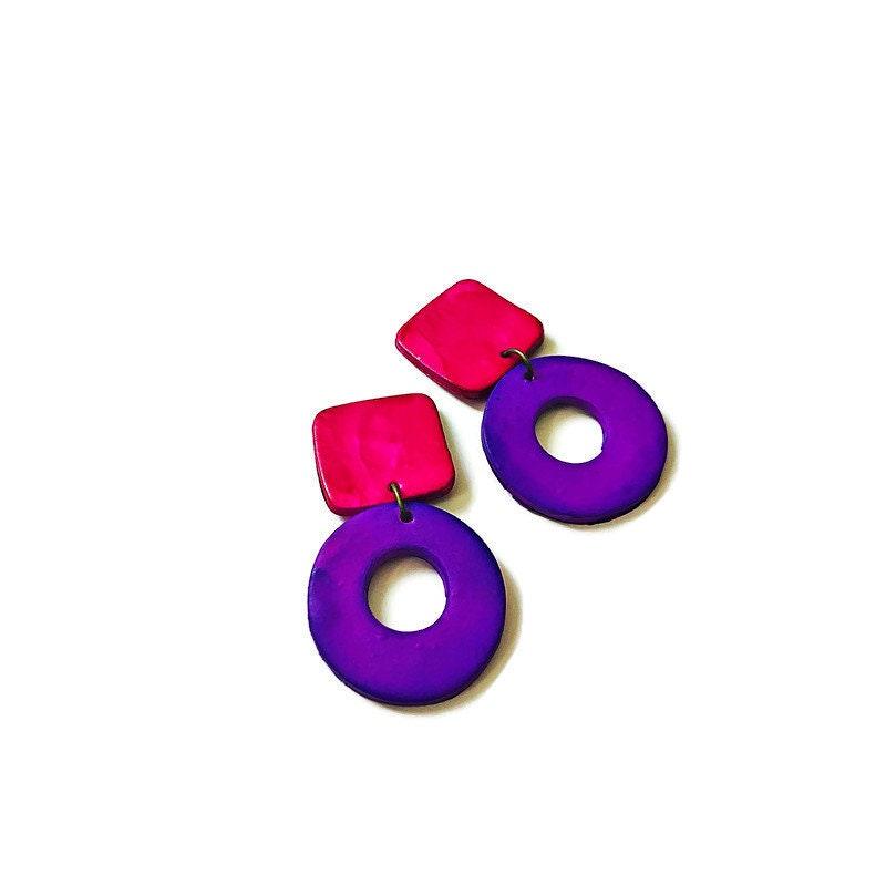 Geometric statement earrings with pink squares and purple hoop rings
