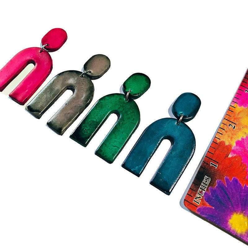 Arch statement earrings